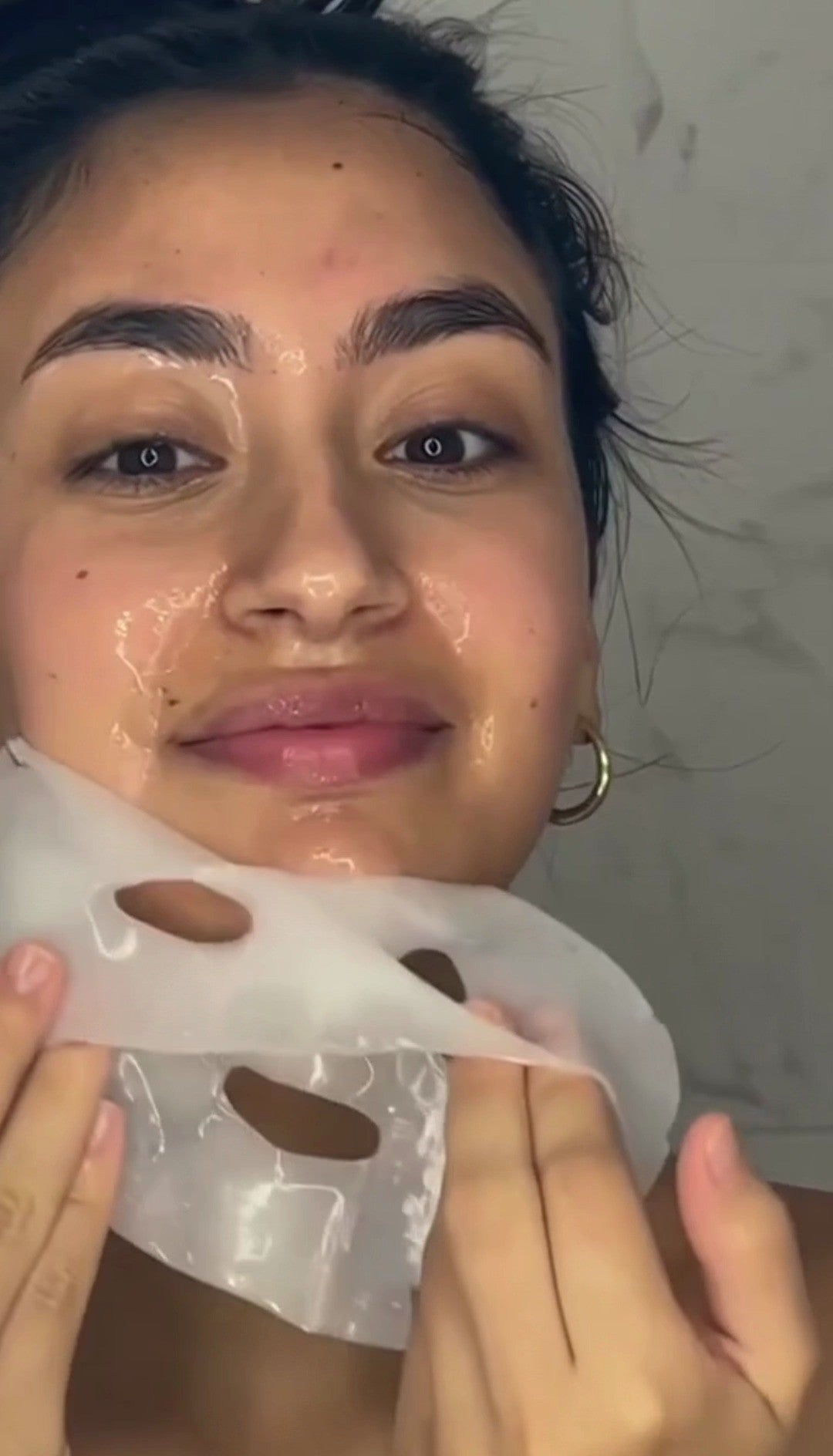 Real customer applying the Bio-Collagen mask — video frame